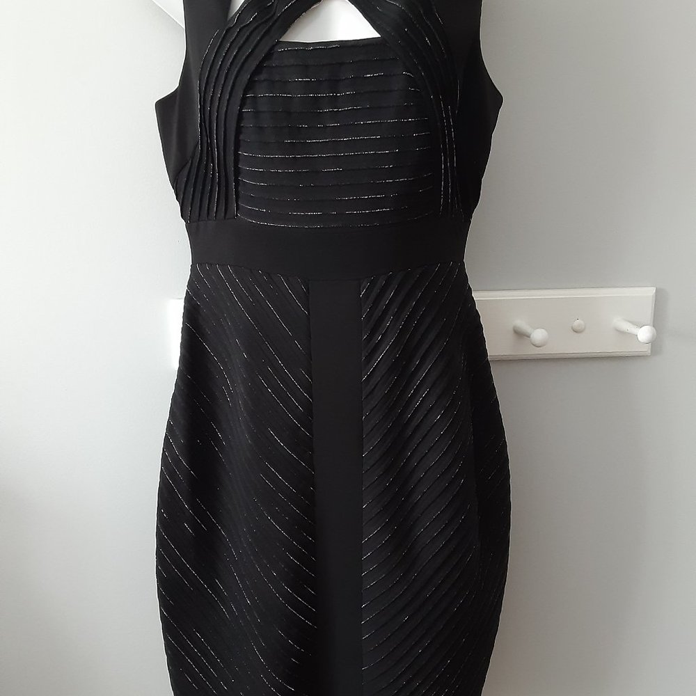 Sexy Cut Dress.  DRESS FOR PARTY, BUSINESS OR CASUAL. SIZE 8.LIKE NEW